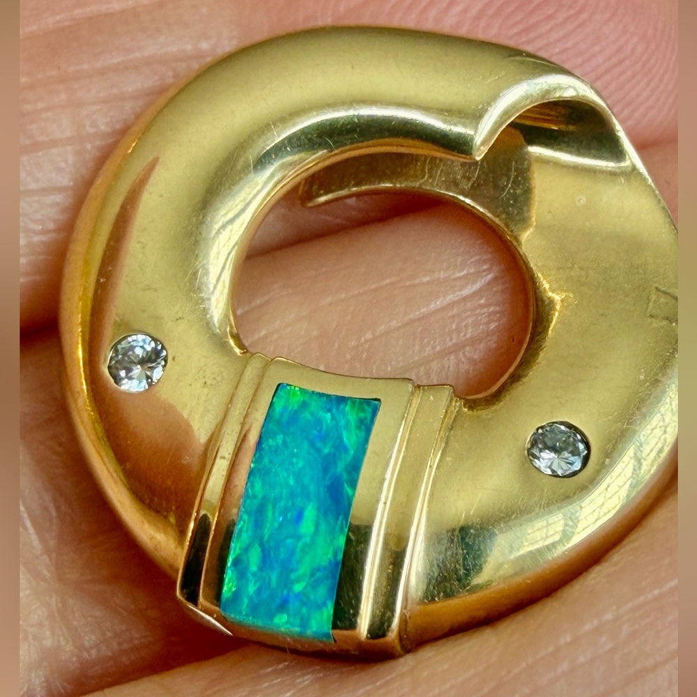 14 karat gold, diamond, and opal pendant
